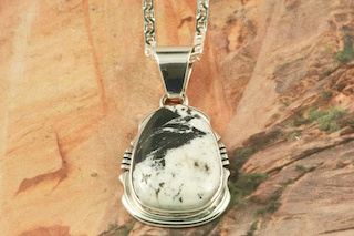 White Buffalo Turquoise set in Sterling Silver Pendant. This Beautiful Stone is formed from the minerals Calcite and Iron. It is mined near Tonopah Nevada. Free 18
